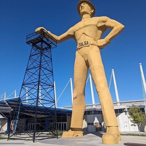tusla Famous Tulsa statue depicting a man, located in the city’s public area.